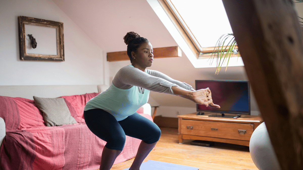 woman working out at home