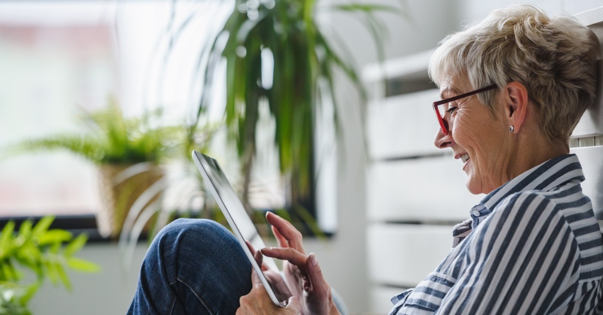 senior woman on electronic tablet device